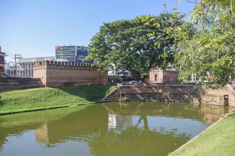 The moat and brick walls by Chang Phueak Gate on the north side of Chiang Mai's old city, near Santitham