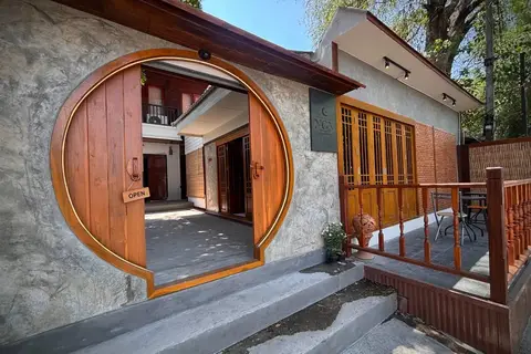House of Nox: round-door entrance opening onto a courtyard